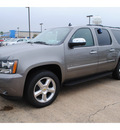 chevrolet suburban 2012 steel gray suv ltz 1500 flex fuel 8 cylinders 2 wheel drive automatic with overdrive 77566