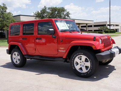 jeep wrangler unlimited 2011 red suv sahara gasoline 6 cylinders 4 wheel drive automatic with overdrive 76011