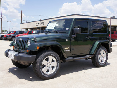 jeep wrangler 2011 green suv sahara gasoline 6 cylinders 4 wheel drive automatic with overdrive 76011
