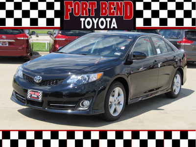 toyota camry 2012 black sedan se gasoline 4 cylinders front wheel drive automatic with overdrive 77469
