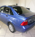 ford focus 2005 blue sedan zx4 gasoline 4 cylinders front wheel drive automatic 79935