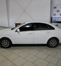 suzuki forenza 2006 white sedan gasoline 4 cylinders front wheel drive automatic 79935