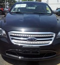 ford taurus 2010 black sedan limited gasoline 6 cylinders front wheel drive automatic 75964