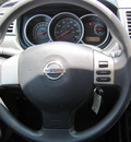 nissan versa 2011 black hatchback gasoline 4 cylinders front wheel drive automatic 33884
