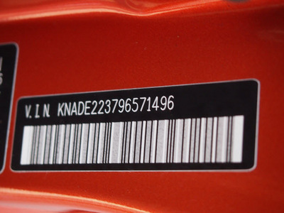 kia rio 2009 orange sedan lx gasoline 4 cylinders front wheel drive automatic 77090