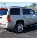 cadillac escalade 2009 gold suv flex fuel 8 cylinders all whee drive automatic 77074
