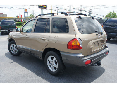 hyundai santa fe 2004 beige suv gasoline 4 cylinders front wheel drive automatic 77565