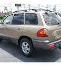 hyundai santa fe 2004 beige suv gasoline 4 cylinders front wheel drive automatic 77565