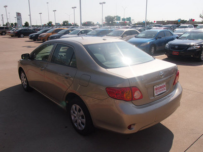 toyota corolla 2010 tan sedan le gasoline 4 cylinders front wheel drive automatic 76053