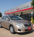 toyota corolla 2010 tan sedan le gasoline 4 cylinders front wheel drive automatic 76053