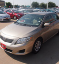 toyota corolla 2010 tan sedan le gasoline 4 cylinders front wheel drive automatic 76053