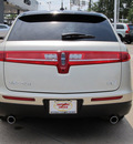 lincoln mkt 2010 gold suv gasoline 6 cylinders front wheel drive automatic with overdrive 77074