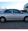 toyota corolla 2010 silver sedan le gasoline 4 cylinders front wheel drive automatic 77034