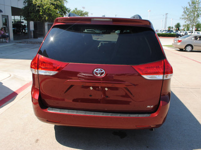 toyota sienna 2012 dk  red van xle 7 passenger auto access se gasoline 6 cylinders front wheel drive 6 speed automatic 76053