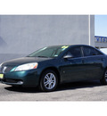 pontiac g6 2006 dk  green sedan gasoline 6 cylinders front wheel drive automatic 79407