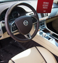 jaguar xf 2012 red sedan portfolio gasoline 8 cylinders rear wheel drive automatic 77090