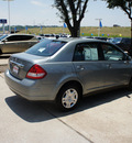 nissan versa 2010 dk  gray sedan 1 8 s gasoline 4 cylinders front wheel drive automatic 76116