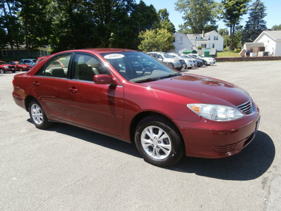 toyota camry 2005 maroon sedan gasoline 6 cylinders front wheel drive automatic with overdrive 13502