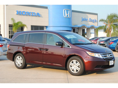 honda odyssey 2012 dk  red van lx gasoline 6 cylinders front wheel drive 5 speed automatic 77065