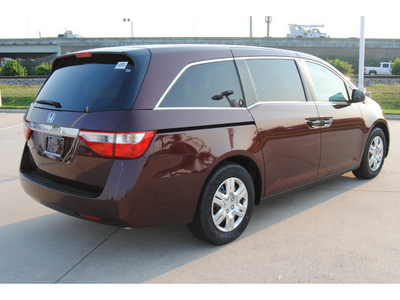 honda odyssey 2012 dk  red van lx gasoline 6 cylinders front wheel drive 5 speed automatic 77065