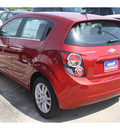 chevrolet sonic 2012 red hatchback gasoline 4 cylinders front wheel drive 5 speed manual 77090