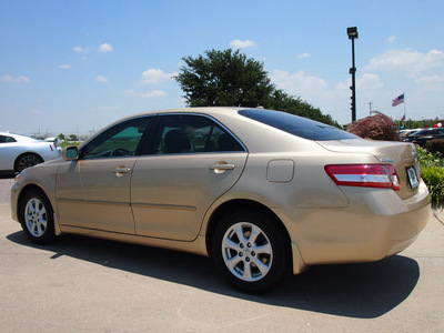 toyota camry 2011 tan sedan le gasoline 4 cylinders front wheel drive automatic 76018