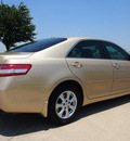 toyota camry 2011 tan sedan le gasoline 4 cylinders front wheel drive automatic 76018