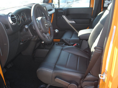 jeep wrangler unlimited 2012 orange suv sahara gasoline 6 cylinders 4 wheel drive not specified 75093