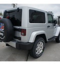 jeep wrangler 2012 bright silver suv sahara gasoline 6 cylinders 4 wheel drive not specified 77338