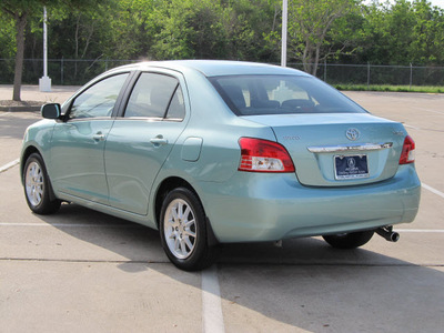 toyota yaris 2007 lt  green sedan gasoline 4 cylinders front wheel drive automatic with overdrive 77074