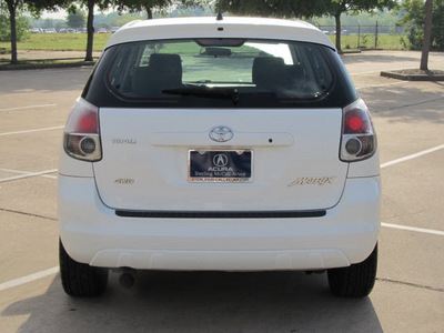 toyota matrix 2005 white hatchback gasoline 4 cylinders all whee drive automatic with overdrive 77074