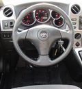 toyota matrix 2005 white hatchback gasoline 4 cylinders all whee drive automatic with overdrive 77074