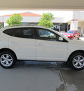 nissan rogue 2009 off white suv sl gasoline 4 cylinders front wheel drive automatic with overdrive 77477