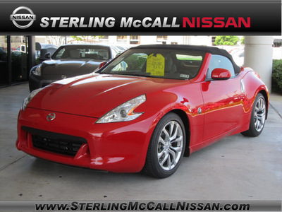 nissan 370z 2012 red roadster touring gasoline 6 cylinders rear wheel drive 6 speed manual 77477