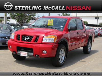 nissan titan 2012 red pro 4x flex fuel 8 cylinders 4 wheel drive automatic with overdrive 77477