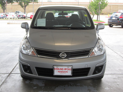 nissan versa 2011 dk  gray sedan 1 8 s gasoline 4 cylinders front wheel drive automatic with overdrive 77477