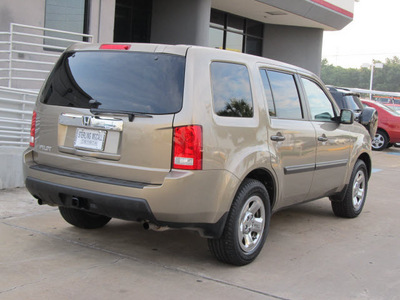 honda pilot 2011 beige suv lx gasoline 6 cylinders front wheel drive automatic with overdrive 77074