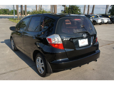 honda fit 2009 black hatchback gasoline 4 cylinders front wheel drive automatic 77339