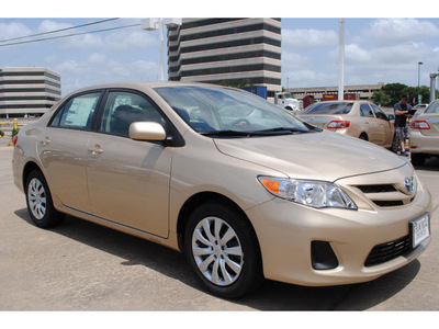 toyota corolla 2012 tan sedan le gasoline 4 cylinders front wheel drive automatic 77074