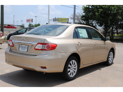 toyota corolla 2012 tan sedan le gasoline 4 cylinders front wheel drive automatic 77074