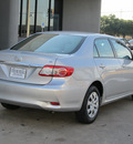 toyota corolla 2011 silver sedan le gasoline 4 cylinders front wheel drive automatic with overdrive 77074