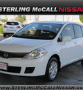nissan versa 2010 white hatchback 1 8 s gasoline 4 cylinders front wheel drive automatic with overdrive 77477