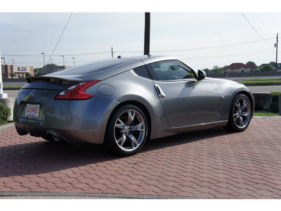 nissan 370z 2009 lt  gray coupe touring gasoline 6 cylinders rear wheel drive 6 speed manual 77642