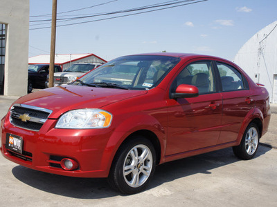 chevrolet aveo 2011 red sedan lt gasoline 4 cylinders front wheel drive automatic 79029