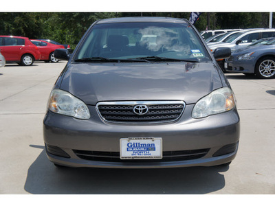 toyota corolla 2005 brown sedan gasoline 4 cylinders front wheel drive automatic 77090