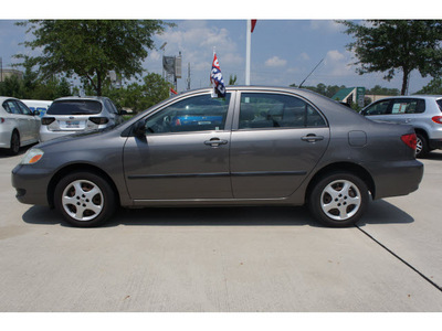 toyota corolla 2005 brown sedan gasoline 4 cylinders front wheel drive automatic 77090