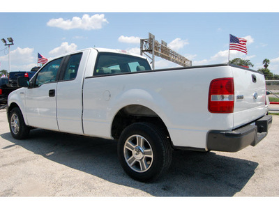 ford f 150 2007 white xl gasoline 8 cylinders rear wheel drive automatic with overdrive 77020