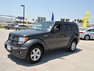 dodge nitro 2011 dk  gray suv sxt gasoline 6 cylinders 2 wheel drive 4 speed automatic 78521