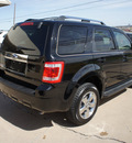 ford escape 2009 black clearcoat suv limited gasoline 6 cylinders front wheel drive 6 speed automatic 76108