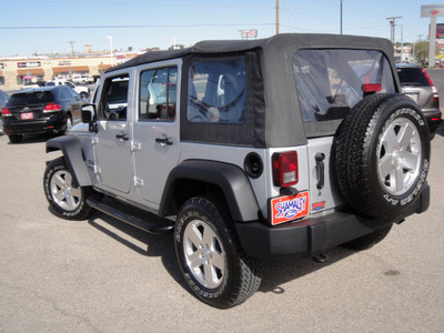 jeep wrangler unlimited 2010 silver suv sport gasoline 6 cylinders 4 wheel drive automatic 79936